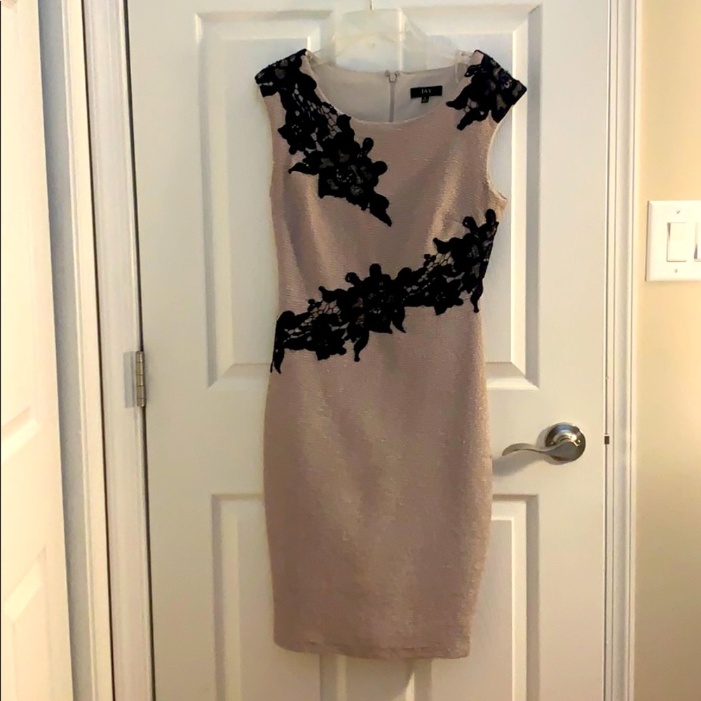 Nude colored cocktail dress with floral accents